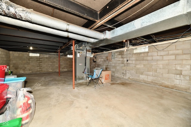 basement featuring heating unit