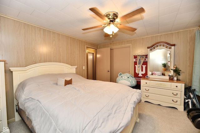 bedroom with ceiling fan and carpet floors