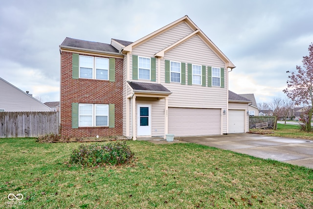 view of front of home featuring a front lawn and a garage