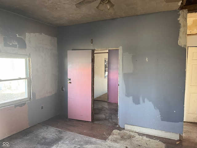 unfurnished room featuring ceiling fan