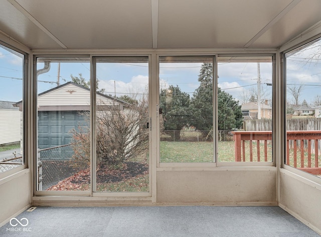 unfurnished sunroom with a healthy amount of sunlight