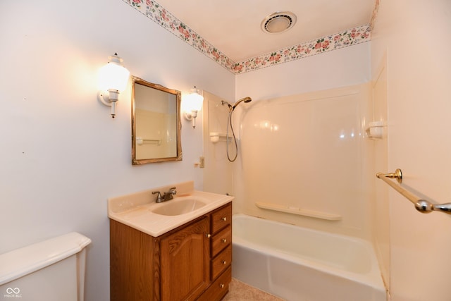 full bathroom with toilet, vanity, and bathing tub / shower combination