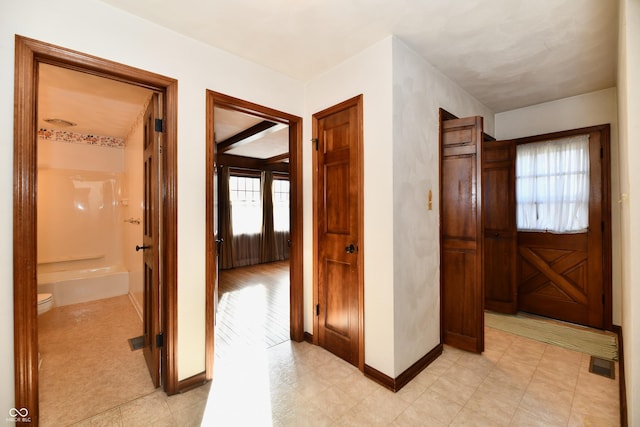 hallway with a wealth of natural light