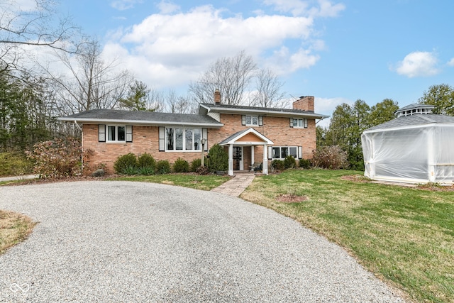 view of front of property with a front lawn