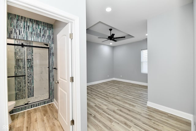 interior space featuring light hardwood / wood-style flooring and ceiling fan