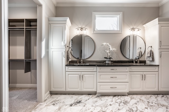 bathroom with vanity and crown molding