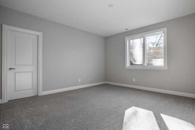 view of carpeted spare room