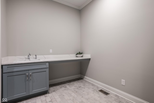 bathroom featuring vanity and crown molding