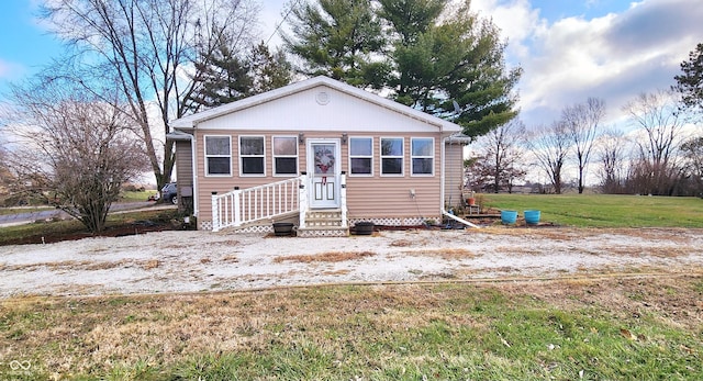 view of front of house with a front lawn