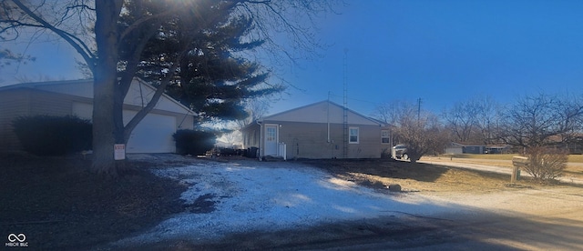 exterior space featuring a garage