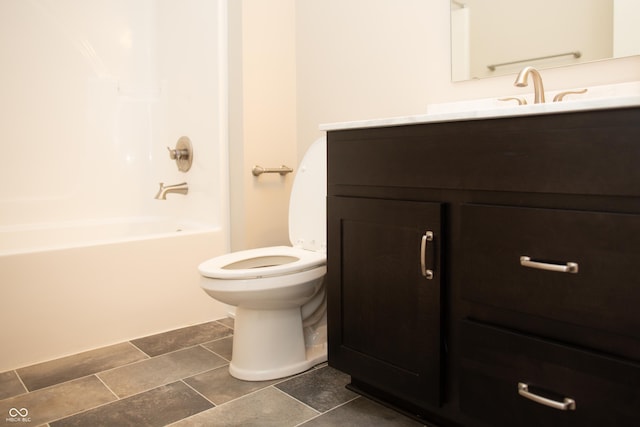 full bathroom featuring vanity, toilet, and shower / bathtub combination