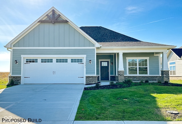 craftsman-style home featuring a front lawn and a garage