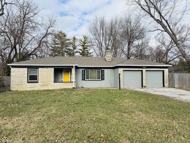 single story home featuring a garage and a front lawn