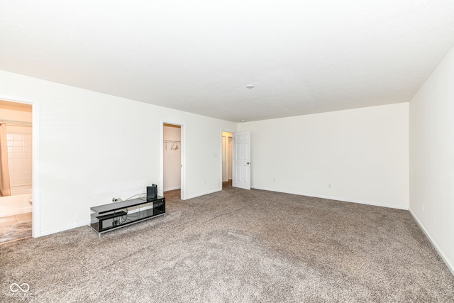 unfurnished living room with carpet flooring