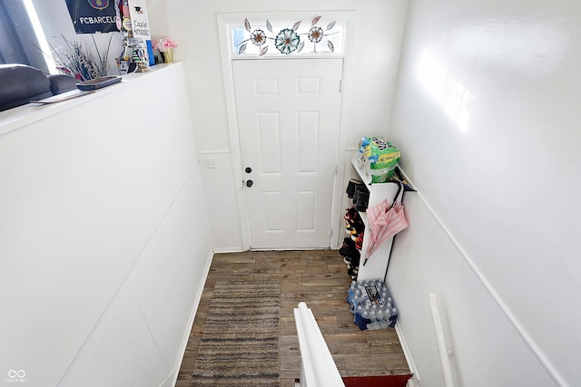 doorway with dark hardwood / wood-style floors