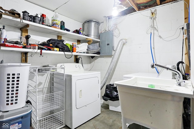 washroom with electric panel, washer / clothes dryer, and sink