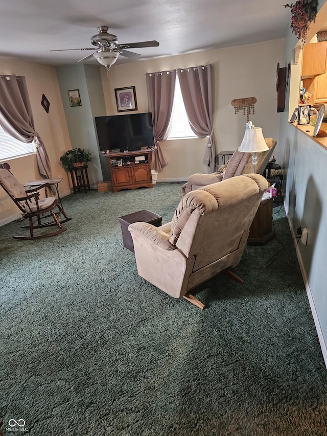 living room featuring carpet flooring and ceiling fan