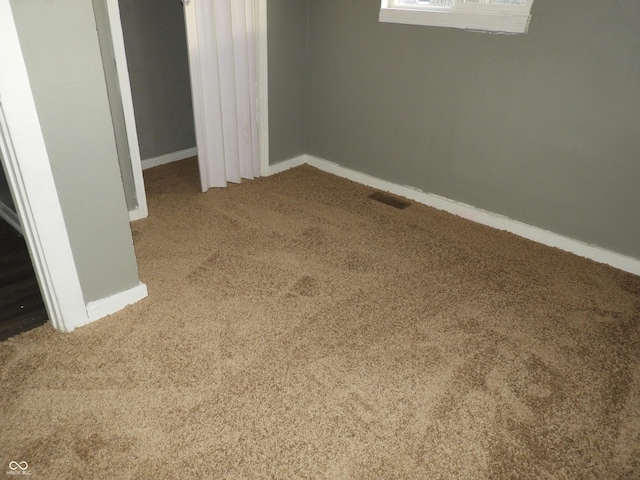 basement featuring carpet floors