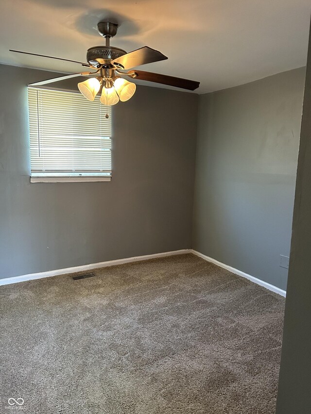 2270 Wheeler St, Indianapolis, IN 46218 - empty room featuring baseboards, visible vents, a ceiling fan, and carpet flooring