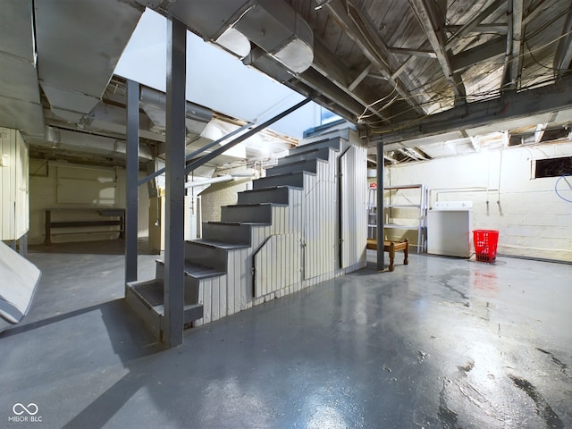 basement with washer / clothes dryer