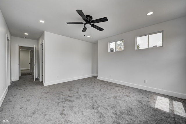 carpeted empty room with ceiling fan