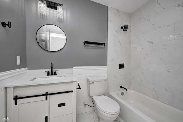 full bathroom with vanity, toilet, and tiled shower / bath