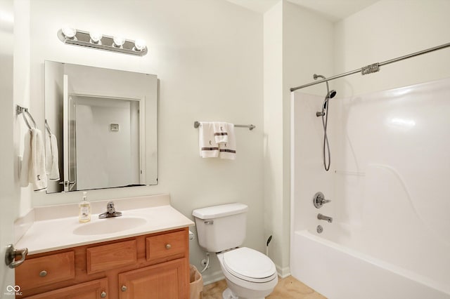 full bathroom with washtub / shower combination, vanity, and toilet