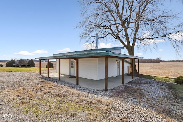 exterior space with a rural view