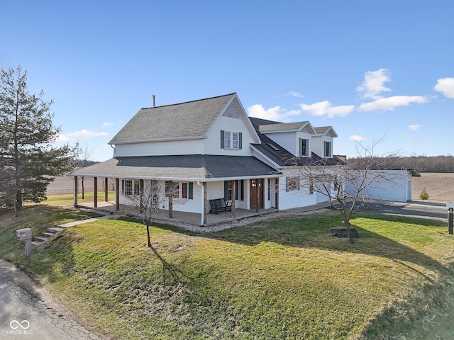 farmhouse with a patio and a front yard