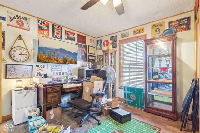 office area featuring ceiling fan, wood-type flooring, and a textured ceiling