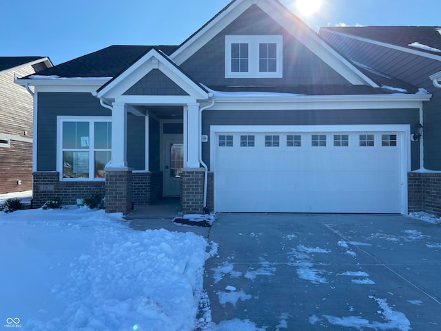 craftsman house featuring a garage