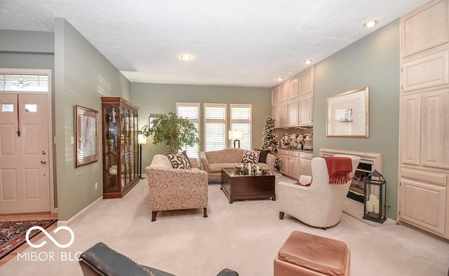 living room featuring light colored carpet