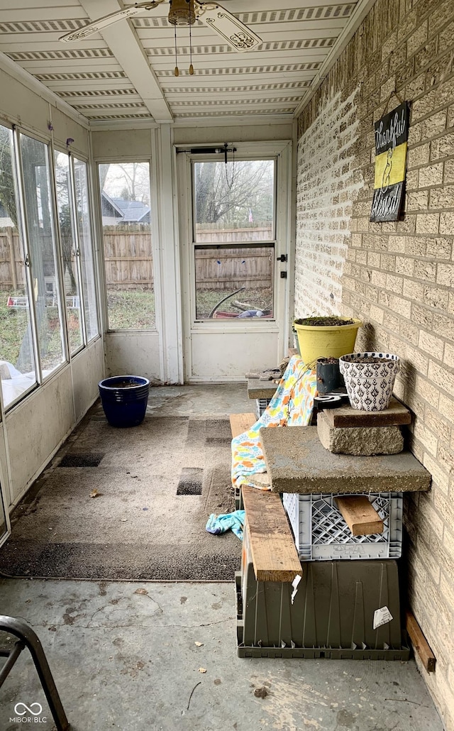 unfurnished sunroom featuring a healthy amount of sunlight