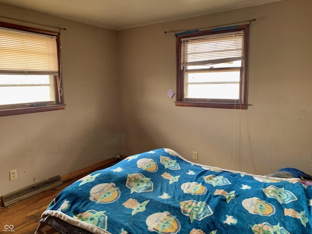 unfurnished bedroom with wood-type flooring