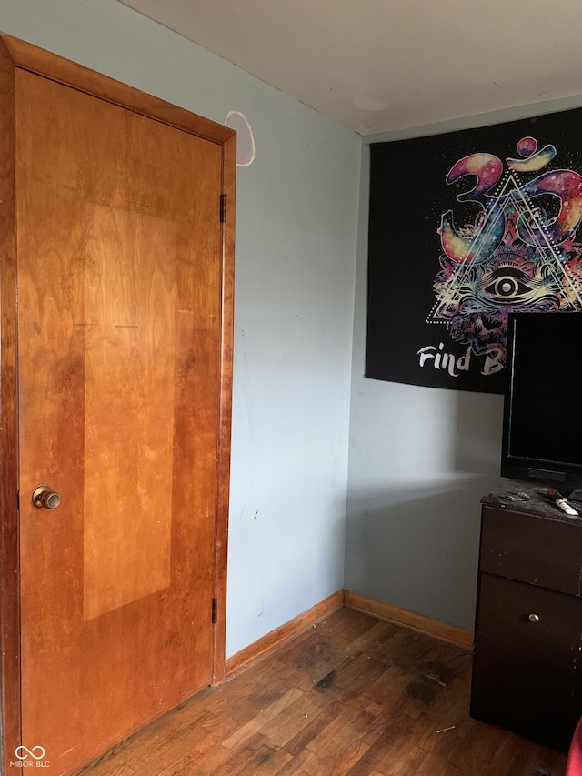 bedroom featuring hardwood / wood-style floors