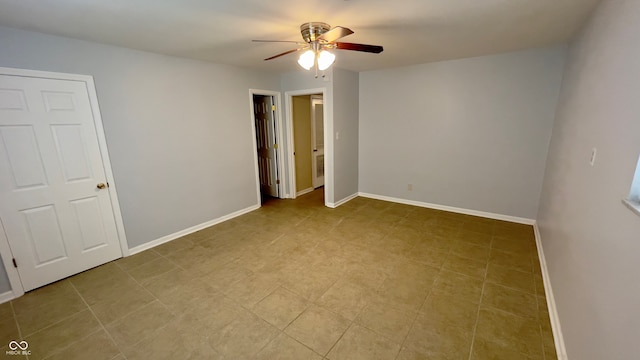 spare room featuring ceiling fan