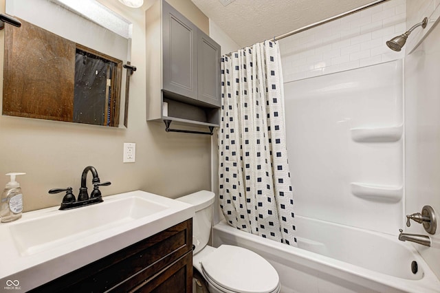 full bathroom featuring vanity, shower / bath combination with curtain, a textured ceiling, and toilet