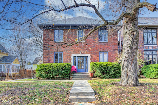 view of front of home with a front lawn