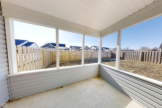 sunroom with a residential view