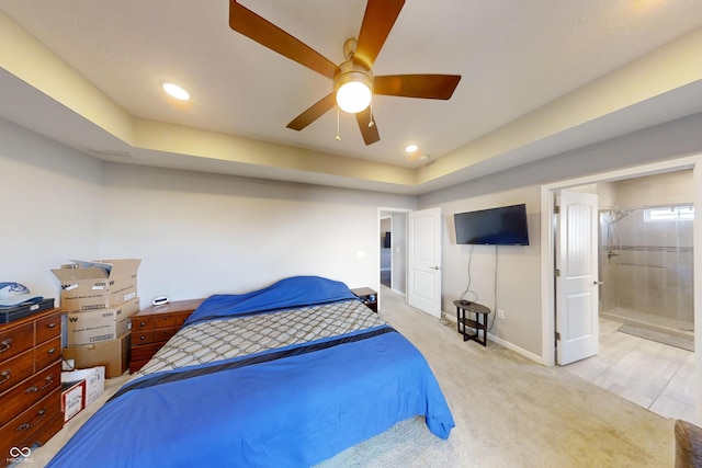 bedroom with ceiling fan, connected bathroom, recessed lighting, light carpet, and baseboards