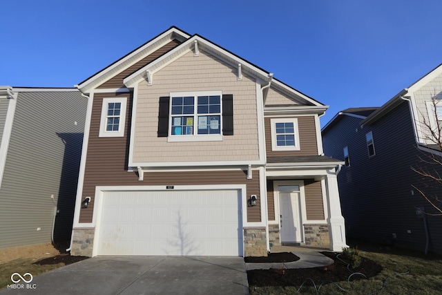 craftsman house with a garage