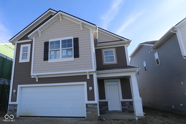 craftsman-style house with a garage