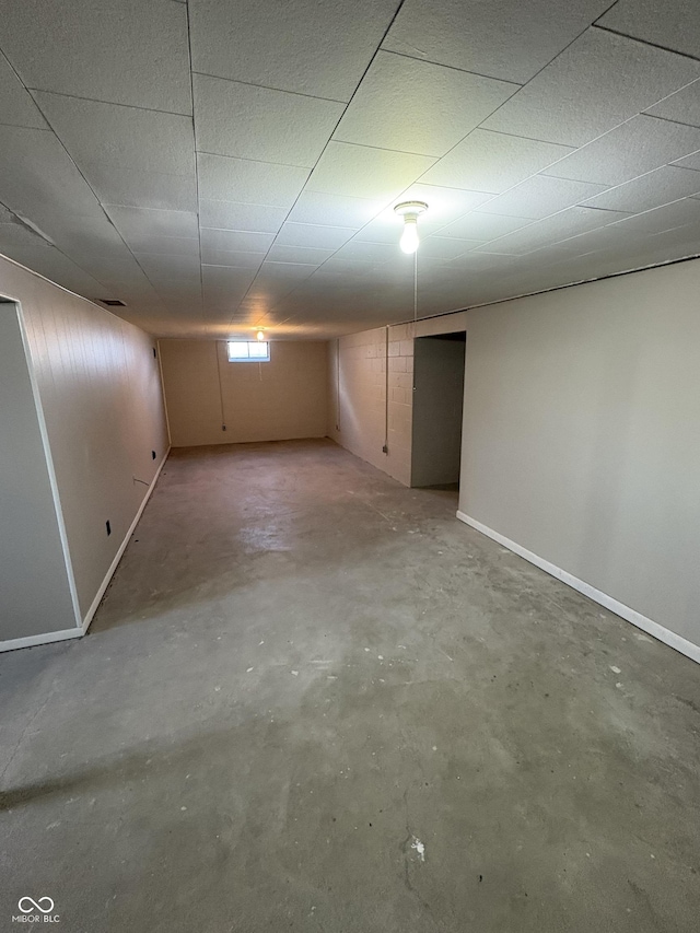 basement with a drop ceiling