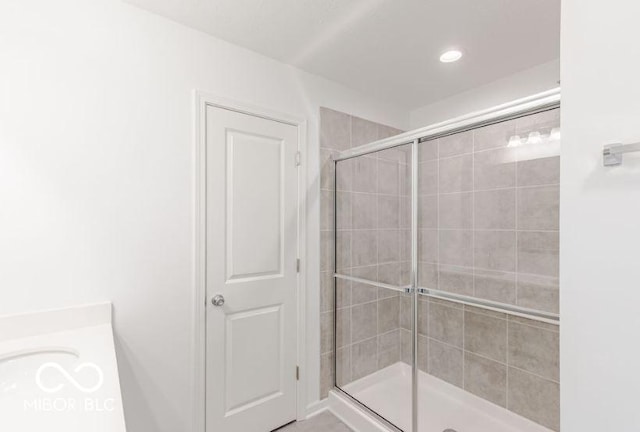 full bathroom featuring a stall shower