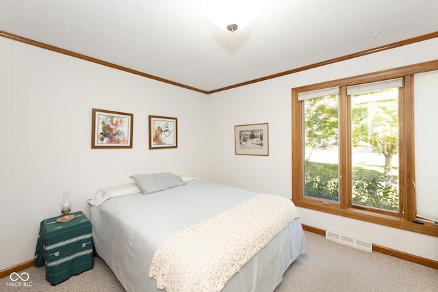 carpeted bedroom featuring ornamental molding