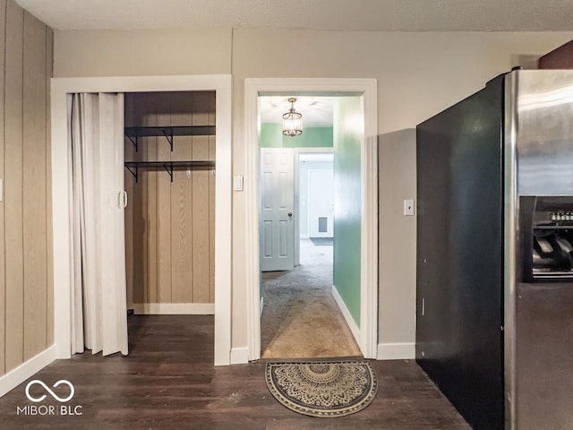 corridor featuring hardwood / wood-style flooring