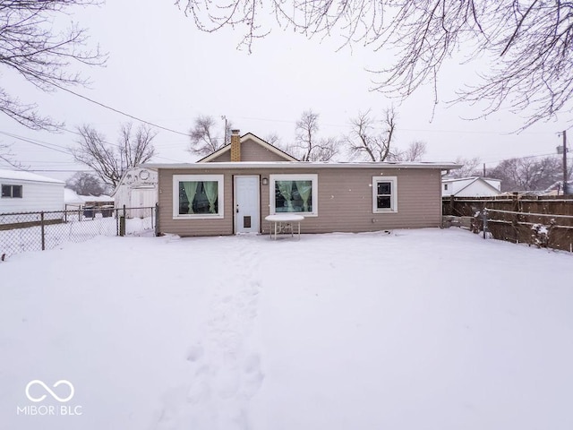 view of snow covered property