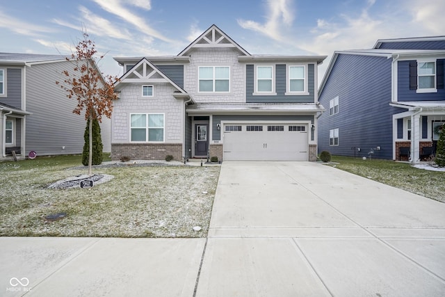 craftsman inspired home featuring a front lawn and a garage