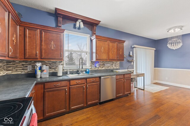 kitchen featuring range with electric cooktop, dishwasher, sink, dark hardwood / wood-style floors, and decorative backsplash