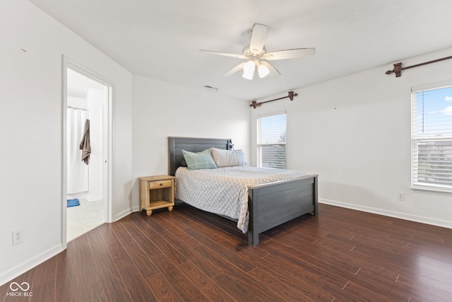 bedroom with dark hardwood / wood-style floors, ceiling fan, and ensuite bathroom